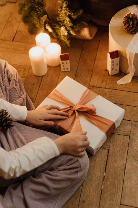 Person Holding White Gift Box